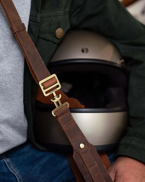 Brown Helmet Strap Holder Trip Machine