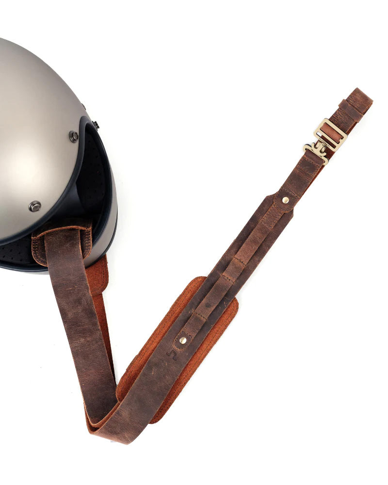 Brown Helmet Strap Holder Trip Machine